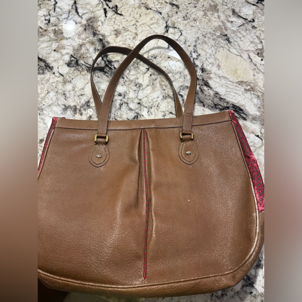Well loved Gucci leather handbag